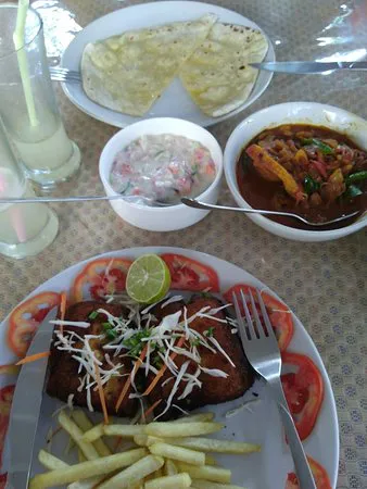 مطعم سبايس روت، كوتشي