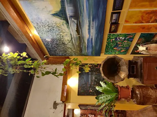 كلاسيك آرت كافيه، كوتشي