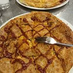 حلواني وبيتزا إسمه إيه