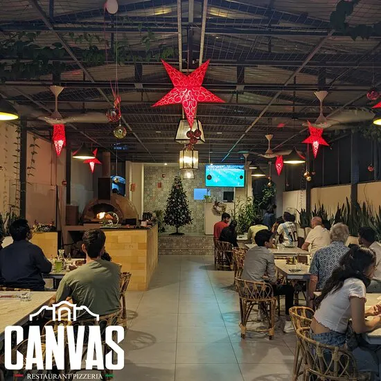 مطعم كانفاس اند بيتزا، كوتشي