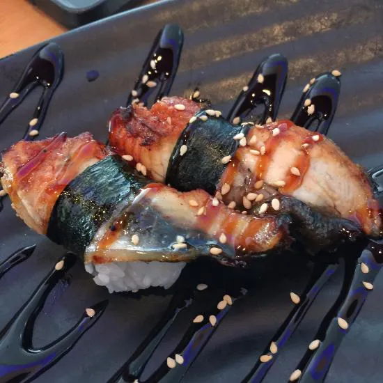 تايكا سوشي بار آند جريل